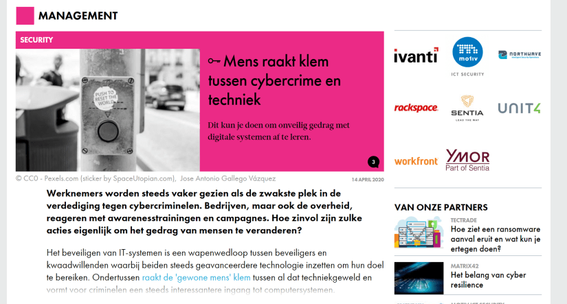 A black and white photograph of one of the Space Utopian reset buttons in Lisbon at a pedestrian crossing. The picture was published by AG Connect..