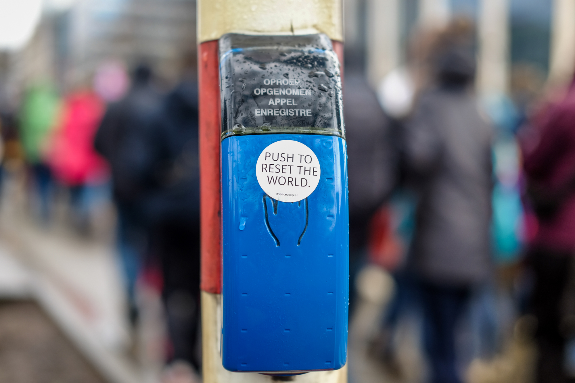 Push to reset the world. Sticker in the streets of Brussels, 2018 © by @Space_Utopian (Brussels, Belgium).